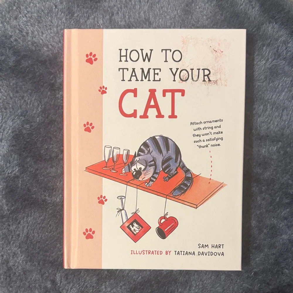How to Tame Your Cat Book by Sam Hart - Illustrated Guide